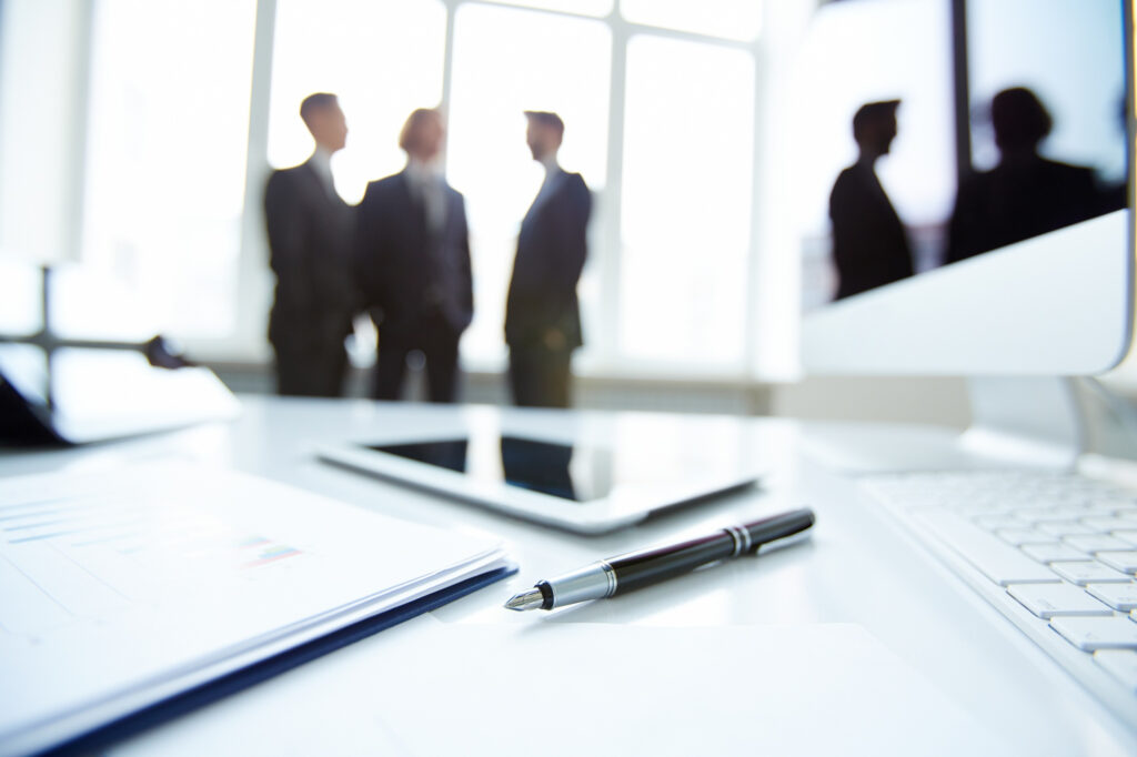 Business team reviewing international VAT compliance for cross-border services