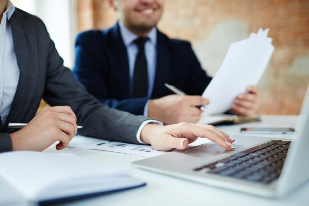 Business team working on HMRC forms and submissions