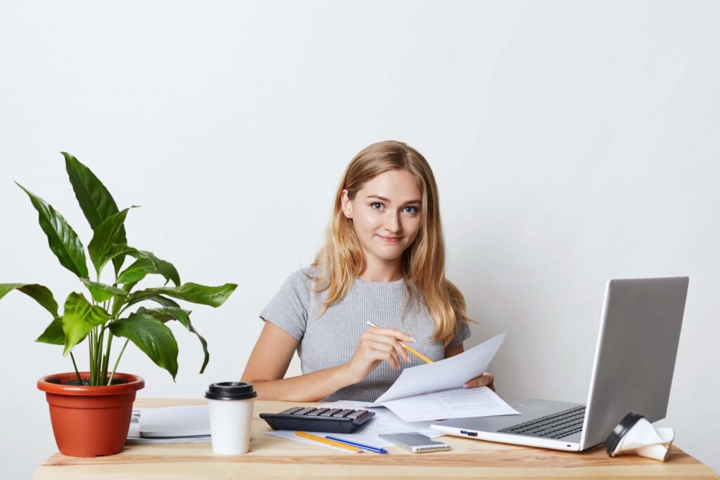 Businesswoman reviewing HMRC correspondence and queries