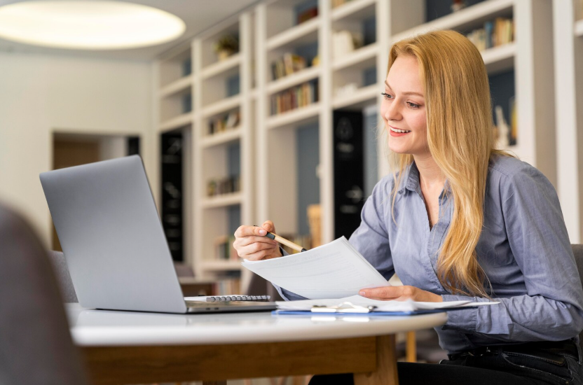 Amended self assessment tax return UK process with HMRC documents and tax calculations